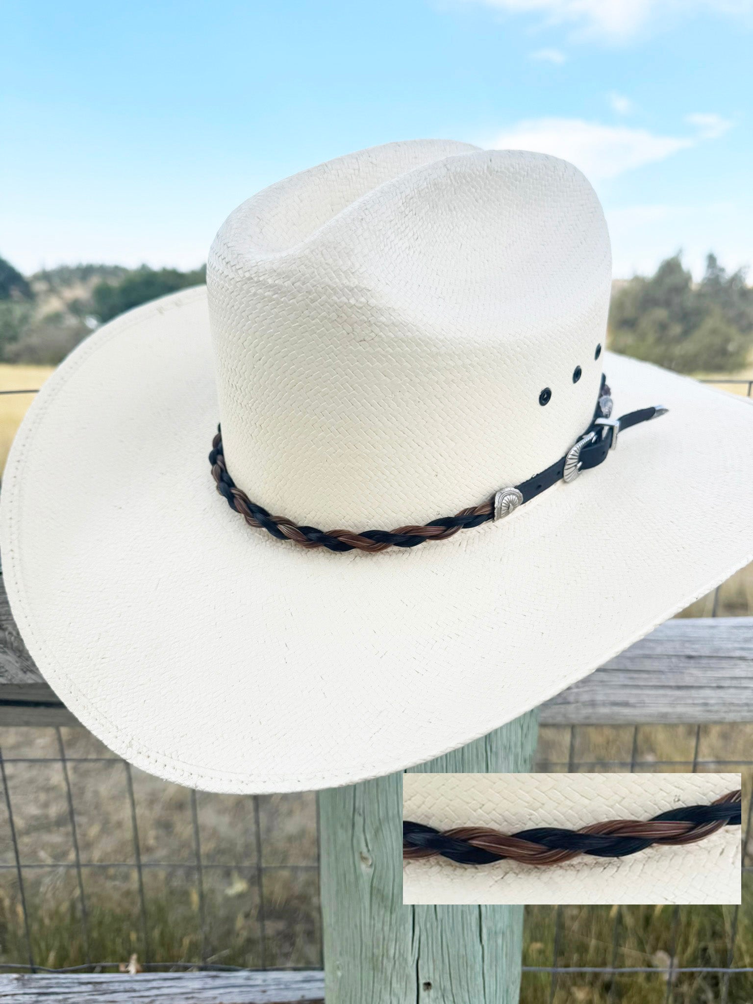 Hand-braided horsehair hatband wrapped around a felt cowboy hat crown