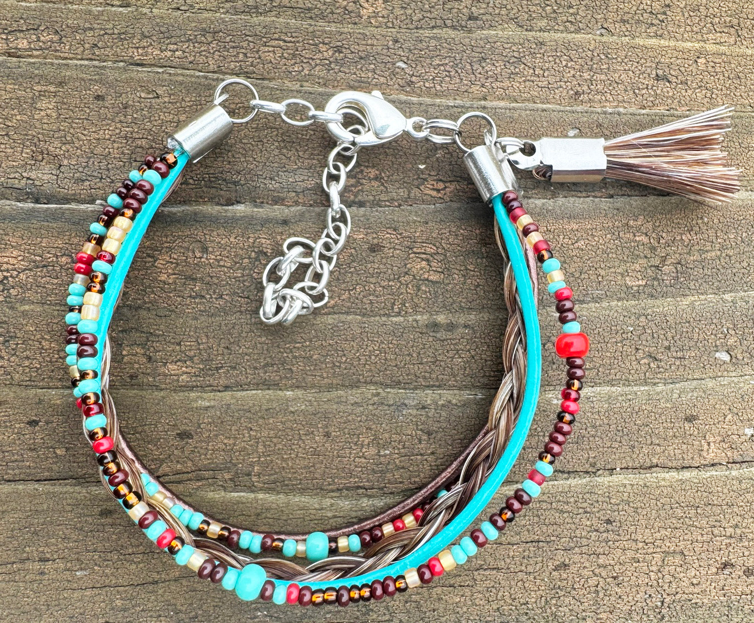 Chama horsehair bracelet beaded in river-canyon blues and earth tones