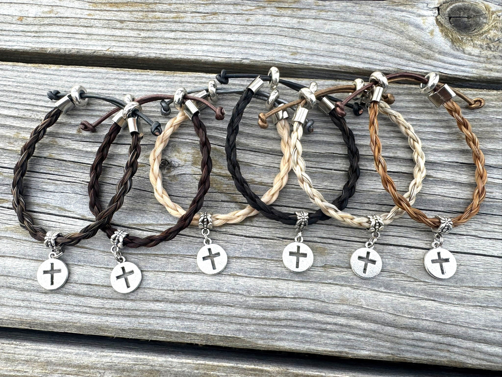 Cross adjustable horsehair bracelet with a small Western cross accent