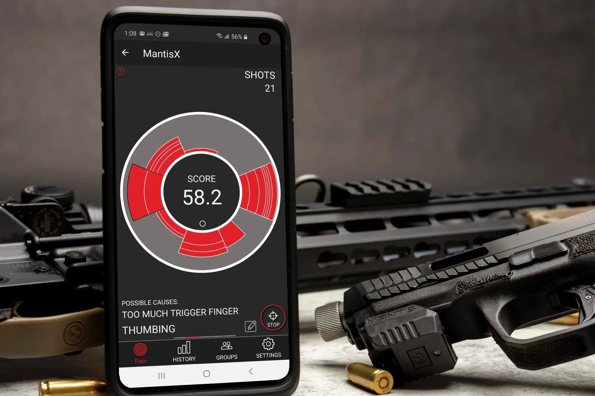 MantisX shot-analysis sensor mounted on a pistol rail with the Mantis training app