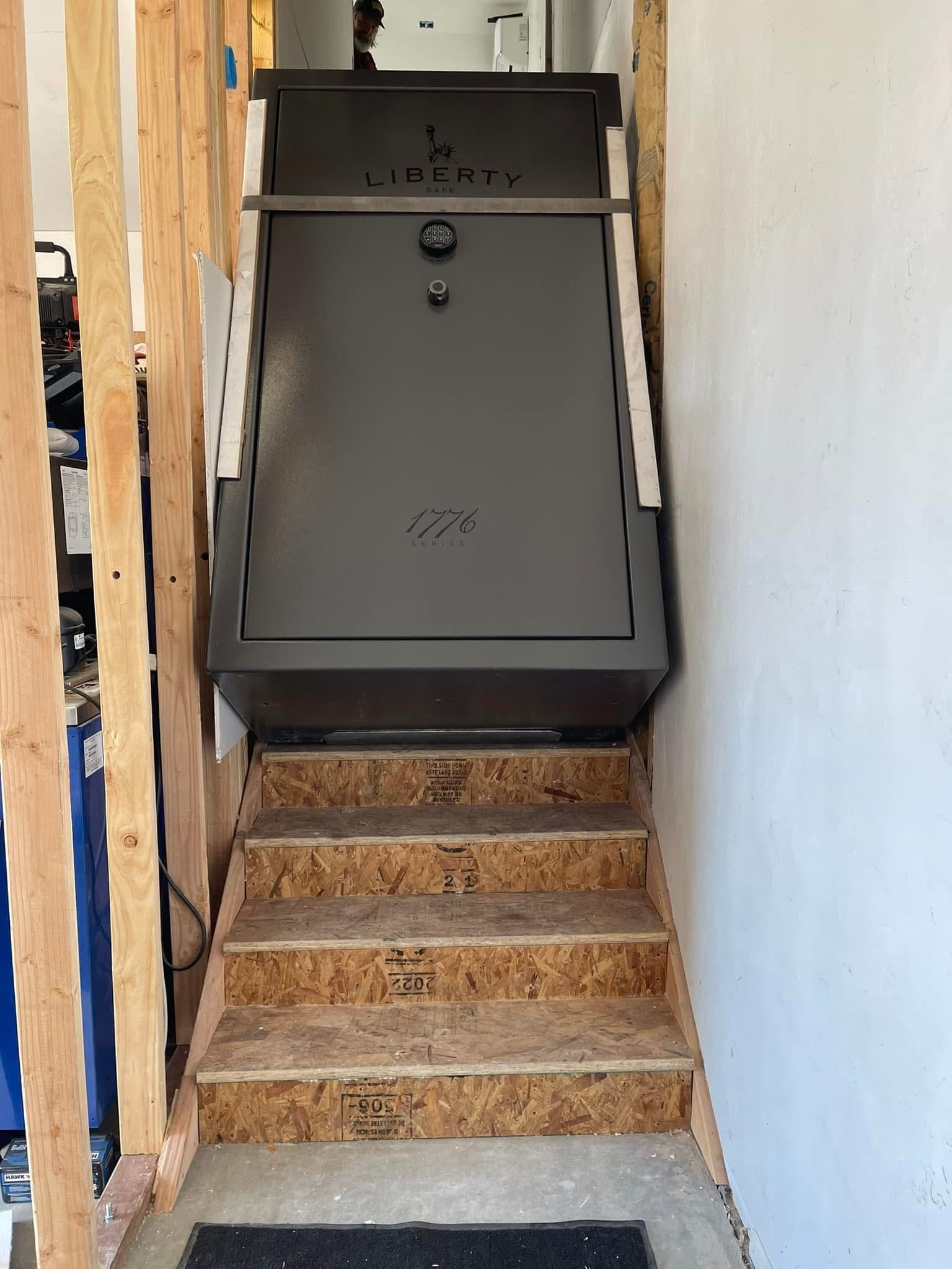Liberty 1776 safe on unfinished residential stairs.